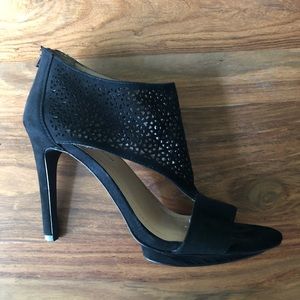 BCBGeneration laser cut black heels